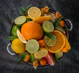 Fototapeta na wymiar Citrus fruits on a wooden table.