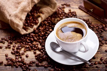 Foto op Plexiglas cup of coffee with beans © Nitr