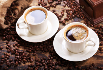 cups of coffee with beans