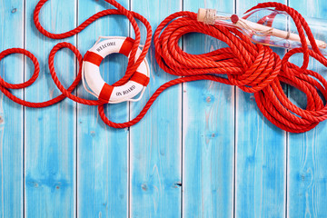 Rescue rope with life preserver and bottle
