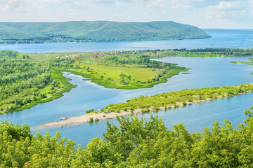 Scenic panoramic view from the height on the tourist part of the Volga river near Samara city at summer sunny day.Beautiful natural landscape.Russia. Europe.