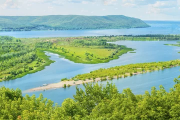 Deurstickers Scenic panoramic view from the height on the tourist part of the Volga river near Samara city at summer sunny day.Beautiful natural landscape.Russia. Europe. © luxerendering