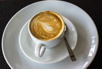 Cup of morning cappuccino
