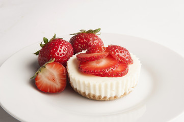 Strawberry cheesecake on a plate close up