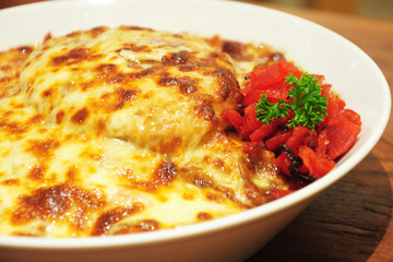 Fusion food backgroud: closeup cheese and pork (Italian-Asian)