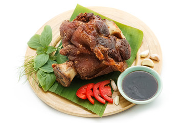 Deep Fried Pork Knuckle serve with vegetable and sauce