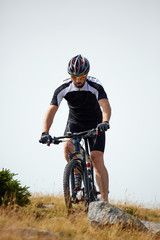 Obraz na płótnie Canvas Mountain biker on trails