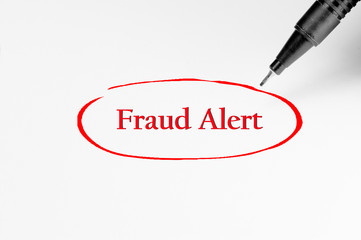 Fraud Alert on white paper - Business Concept