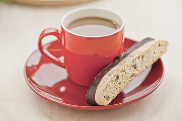 cup of hot coffee with sweet cookies