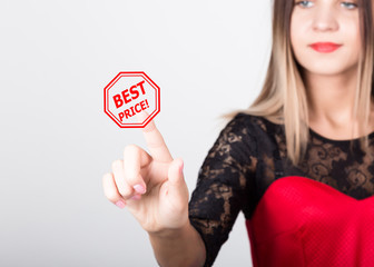 technology, internet and networking concept. beautiful woman in a red dress with lace sleeves. woman presses best price button on virtual screens