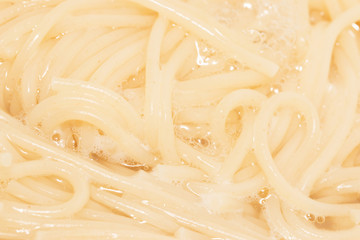 spaghetti boiling in a pot