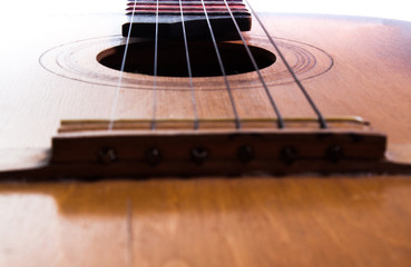 Obraz premium Old guitar on a white background.