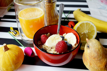 Healthy breakfast, oatmeal with strawberry and raspberry