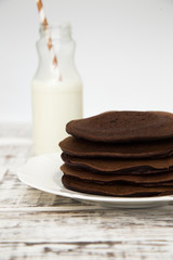 Fototapeta na wymiar Chocolate pancake on a light background