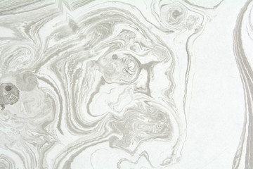 Ebru art. Traditional Turkish Ebru technique. Marbling painting on water transferred on highly...