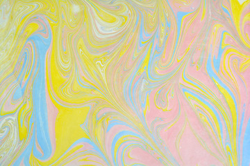 Ebru art. Traditional Turkish Ebru technique. Marbling painting on water transferred on highly textured paper or cloth. Color paint ebru with waves and tile pattern.