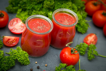 fresh organic tomatoes and tomato juice with parsley. the detox