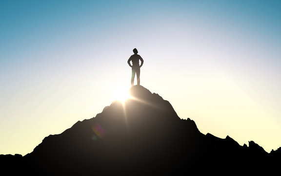 Silhouette Of Businessman On Mountain Top