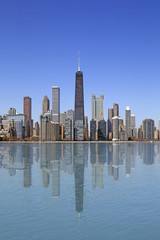 Lake view of Chicago city with buildings reflection on the water