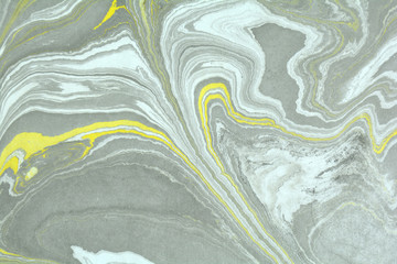 Ebru art. Traditional Turkish Ebru technique. Painting on water transferred on highly textured paper or cloth. Color paint ebru with waves and tile pattern.