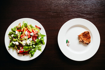 salad with pills and meat