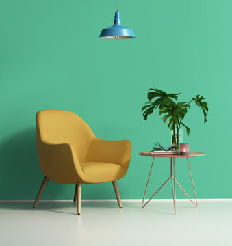 Yellow armchair over a green wall