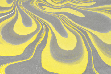 Yellow liquid ink. Creative artistic design. Ebru abstract illustration. Marbling texture. Decorative background. Flowing acrylic paints. Ebru art. Traditional Turkish technique.
