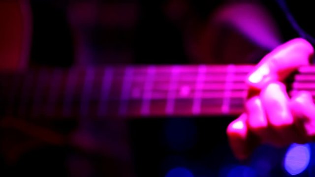 guitar, close-up, concert lighting, acoustic
