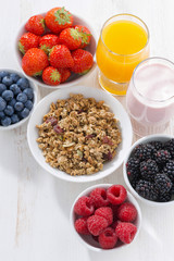 fresh berries, granola, juice and yogurt 