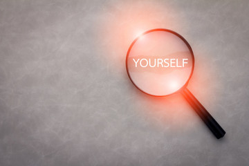 finding yourself concept with word and magnify.jpg