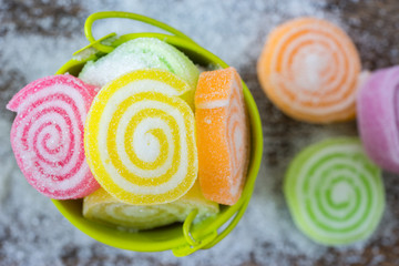 Jelly sweet, flavor fruit, candy dessert colorful on wooden back