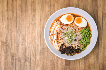Spicy Tom Yum, Creamy Pork Ramen with Egg, Sugar Pea, Tofu and M