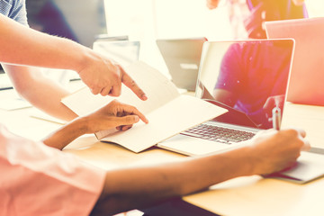 Graphic designer using graphics tablet and computer laptop in th