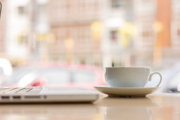 coffee cup on wooden table ,soft focus