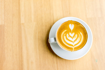 coffee cup on wooden table ,soft focus