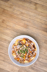 Traditional Japanese food, Oyakodon and rice in a bowl. (Chicken