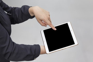 Woman hands holding a digital tablet
