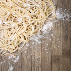 ramen, chinese vermicelli on wooden background