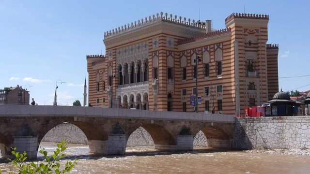 Sarajevo old library Vijecnica bridge river Miljacka.