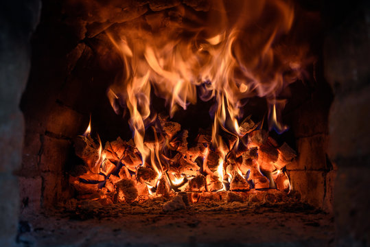 fire in a traditional oven for cooking baking