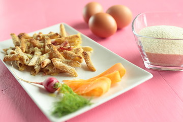 Macaroni coated with egg