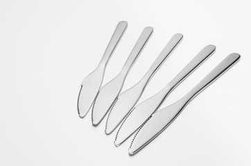 Silverware or flatware set isolated on white background. Concept composition with copy space