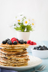 Pancake with blueberries and raspberries 