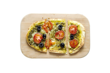 top view of pizza on wooden board.