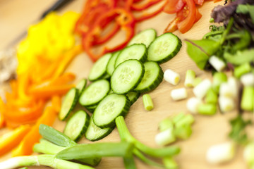 Close bokeh shot of fresh sliced English cucumber