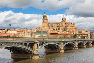 Salamanca - The Cathedral and bridge Puente Enrique Estevan Avda and the Rio Tormes river.