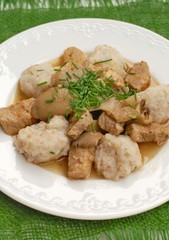 Goulash with oyster mushroom and buckwheat dumplings on the green gunny cloth