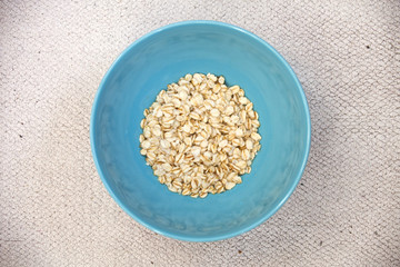 oatmeal in blue cup, top view