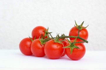 Tomatoes on the white background