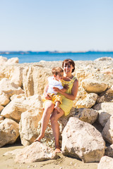 mother and son  on the beach